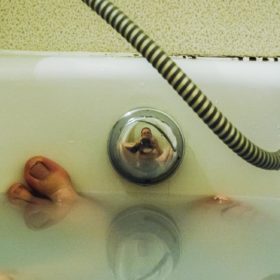Radio Clash 98: The Come Down eclectic music mashup podcast cover shows me in the bath